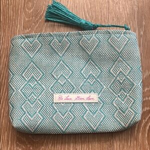 Josie Maran white/turquoise pattern woven cosmetic/makeup bag
